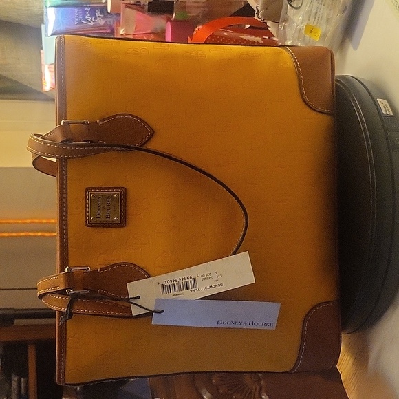 Dooney & Bourke Other - Dooney & bourke yellow or mustard color
